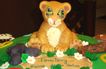 Detalle de Pastel 3D Rey León con cupcakes de animalitos. Técnica Fondant Suizo