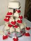 Torre de cupcakes en forma de corazón decorado con fondant suizo